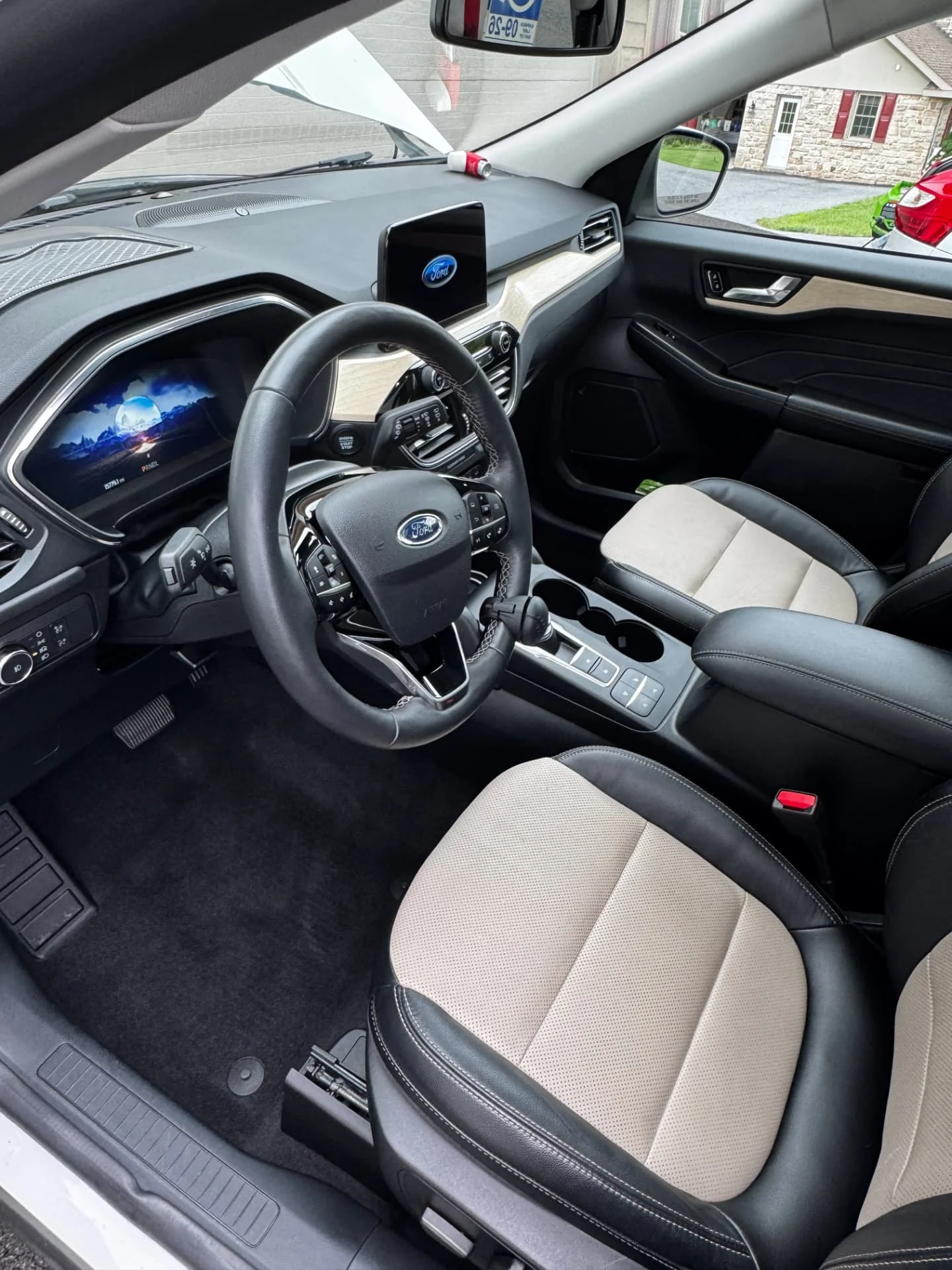 Clean Ford cabin with two-tone seats