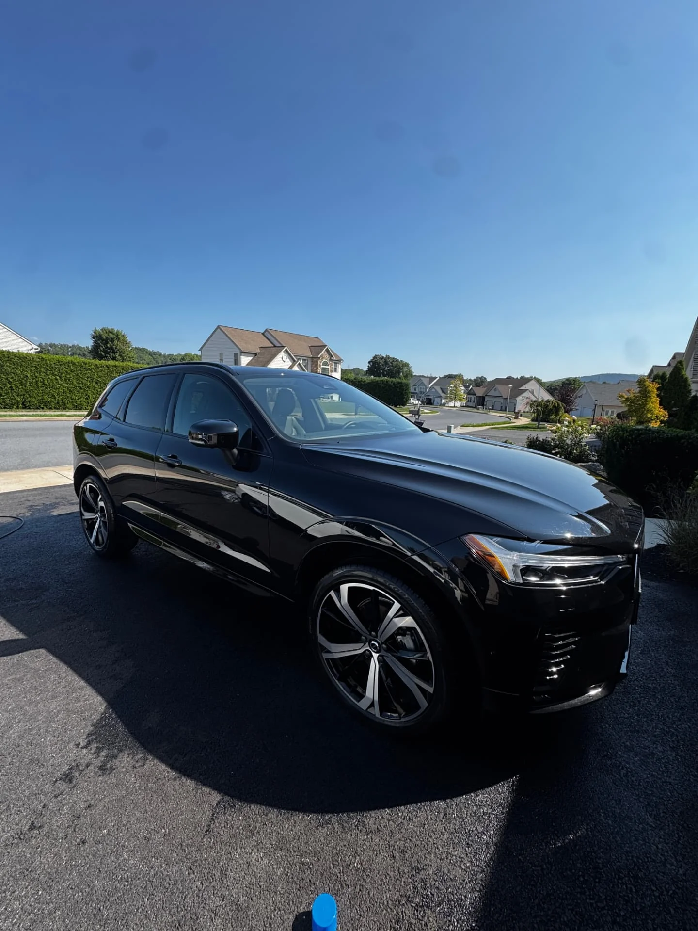 Glossy black SUV after an exterior detail