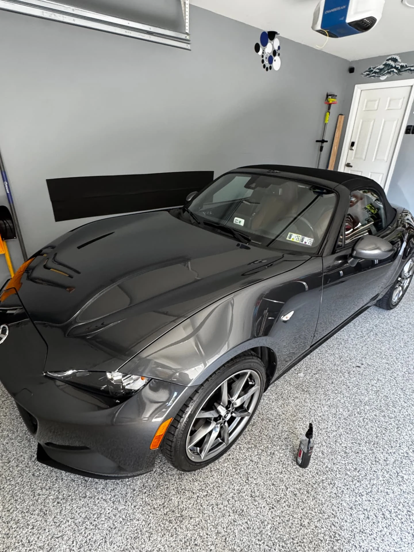 Gloss and reflections on a ceramic-coated Mazda Miata
